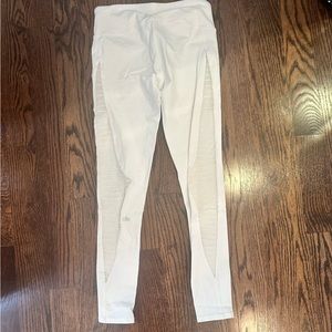 ALO white leggings with mesh cut out on side of the legs